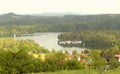 View of the Solinskie Lake in Polanczyk, Poland. Green forests surrounding the Solina lagoon