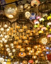 View of some shops selling colorful lamps and decorative and gift ornaments in the Grand Bazaar.