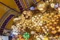 View of some shops selling colorful lamps and decorative and gift ornaments in the Grand Bazaar.