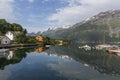 View of Sor fjord from Lofthus with a beautiful reflection of mountains in the background