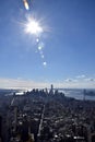View of southern Manhattan including Wall Street area with flare from midday sun