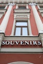 View of souvenirs sign on red building wall Royalty Free Stock Photo