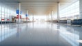 A view from a spacious airport terminal with huge windows, without people