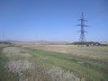 View of spacious meadows and remote ancient mountains