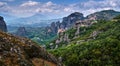 View of spectacular rocks of Meteora, Thessaly, Greece and valley. Nunnery of Moni Agias Varvaras Roussanou and Varlaam Royalty Free Stock Photo