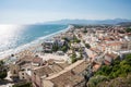 Panoramic landscape of the city and the beach od Sperlonga at sunset. Aerial view. Italian coastline.