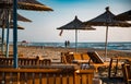 couple walking in Spille beach during sunset in Albania