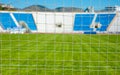 View of the sports stadium through the net of the football goal Royalty Free Stock Photo