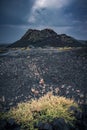 View of the spray cone trail on the horizon, lava hills, volcanic landscape