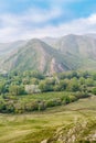 View of the spring mountain landscape through the misty haze. Andreevskie Cones