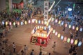 View of the square in front of the Nippori train station decorated for the Obon festival with illuminated paper lanterns in the Royalty Free Stock Photo