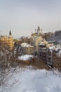 View of St. Andrew`s Church and the historical part of the city covered with snow. Kiev