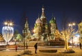 View of St. Basil`s Cathedral and the Kremlin in new year`s evening. Moscow