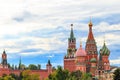 View of St. Basil`s Cathedral and Spasskaya tower of Kremlin on Red Square in Moscow, Russia Royalty Free Stock Photo