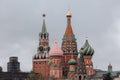 View of St. Basil's Cathedral and Spasskaya tower of Kremlin on Red Square in Moscow, Russia Royalty Free Stock Photo