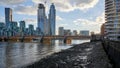 View of St George\'s wharf construction development over vauxhall bridge london and river thames at low tide