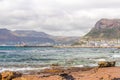 View from St James beach over Kalk Bay towards recreational harbour and breakwater lighthouse built in 1919 in |False Bay, Cape