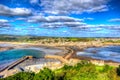 View from St Michaels Mount of Cornwall coast England UK in colourful hdr with cloudscape Royalty Free Stock Photo