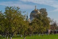 View of St. Nicholas Naval Cathedral through the Apple orchard of the Kronstadt Admiralty Park-Museum