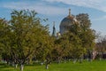 View of St. Nicholas Naval Cathedral through the Apple orchard of the Kronstadt Admiralty Park-Museum