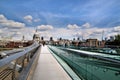 A view of St Pauls Cathedral across the river Thames and the Millennium Bridge Royalty Free Stock Photo