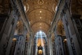 View of St. Peter Basilica interior with rays of light falling on altar Royalty Free Stock Photo