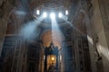 View of St. Peter Basilica interior with rays of light falling on altar Royalty Free Stock Photo