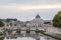 View of St. Peter's Basilica and the bridge over the Tiber River in Rome Royalty Free Stock Photo