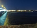 View of St. Petersburg at night. Neva river, bridges, night lighting. Russia