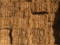 View of stacked hay bales after harvest on the field. Royalty Free Stock Photo