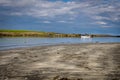 A view of Staffin island and Staffin harbour. Garrafad bay and An Corran Beach. fishing boat and cottage