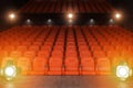 View from the stage of concert hall or theater with red seats an