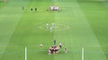 View from the stands with both footy teams in a huddle at Docklands Stadium, Melbourne Royalty Free Stock Photo