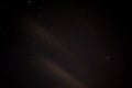 View of stars in a clear night sky with motion in clouds moving acroos the sky above Royalty Free Stock Photo