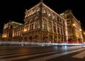 View of State Opera in Vienna, Austria during the night. Bright blue sky, car light trails Royalty Free Stock Photo