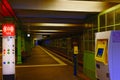 View into a station of the Berlin subway. On the left you can see an SOS telephone, on the right there is a ticket machine Royalty Free Stock Photo