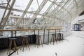View of the statue of independence of Ukraine in the snow from a glass dome with a cafe. Ukraine