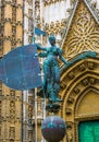 view of a statue situated in front of the main entrance to the cathedral in sevilla...IMAGE Royalty Free Stock Photo