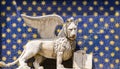 Statue of winged lion on the Clock Tower at Piazza di San Marco in Venice, Italy Royalty Free Stock Photo