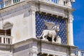 Statue of winged lion on the Clock Tower at Piazza di San Marco in Venice, Italy Royalty Free Stock Photo