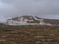 Steaming Svartsengi geothermal power station near Grindavik, Reykjanes, Iceland with moss covered lava field in front in winter. Royalty Free Stock Photo