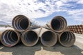 View of the steel pipe piles to build pier in the sea. Royalty Free Stock Photo