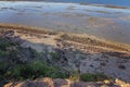 View From A Steep Hilltop Onto A Rocky Beach