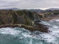 View on steeply-tilted layers of flysch geological formation on Atlantic coast at Zumaia, Basque Country, Spain