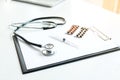 View of stethoscope, drug and equipment on foreground table, Health care and Medical concept