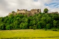 A view of Stirling Castle on top of the rocky hill in central Scotland