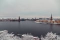 View of the Stockholm City Hall and Riddarholmen and the river on a snowy winter day, Sweden Royalty Free Stock Photo