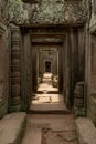 View through stone corridor in ruined temple