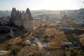 View of stone formations in Cappadocia valley.