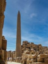 View of a stone obelisk in the ancient temple of the Pharaohs Karnak, Luxor, Egypt. Obelisk is decorated with cartouche